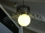 Ski pole chandelier at Paradise we saw on June 29th�Ruth admires the beautiful ingenuity and talent incorporated into the lamps at the Henry M. Jackson Memorial Visitor Center.