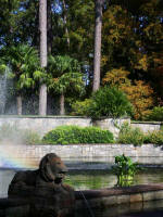 The misty rainbow spray accentuates Renaissance Garden�spouting lion, vista, terraces, stone fences, statues of the seasons, reflecting pool, and fountain.